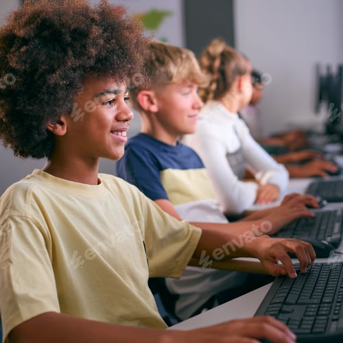 Preview: Multi-Cultural Group Of Secondary Or High School Students At Computers In IT Class