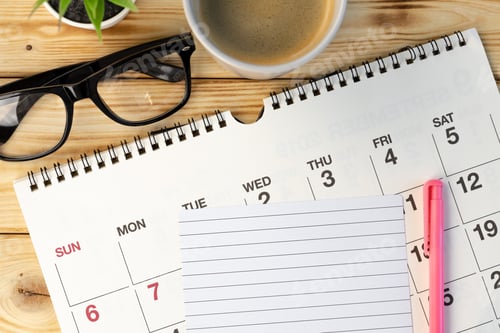 Preview: Calendar page close up on office desk