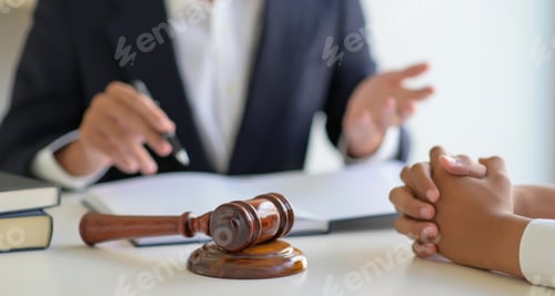 Preview: Cropped shot of Lawyers give advice to clients in the law office.