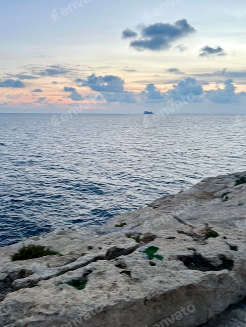 Preview: Sunset on the Mediterranean Sea. Gozo, Malta. Selective focus.