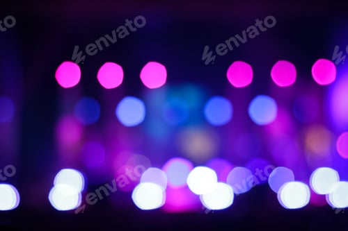 Preview: blurred abstract purple bokeh background. Festive spotted glitter background. Blurry music performan