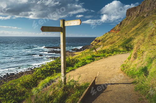 Preview: Close-up crossroad signpost. Ireland shoreline
