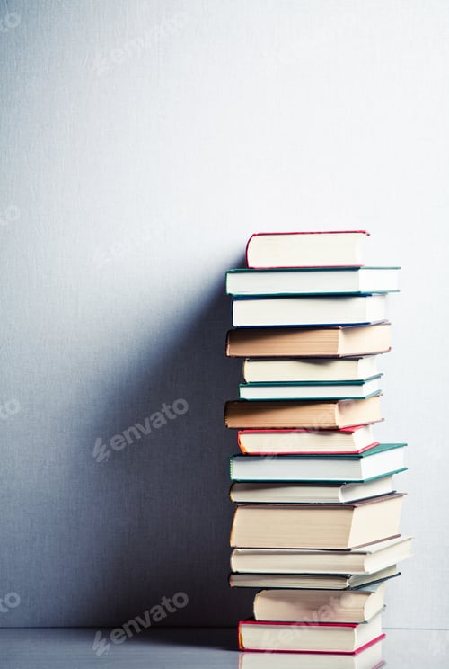 Preview: Very high stack of books