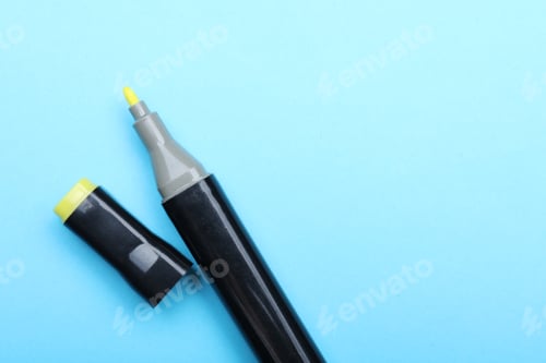 Preview: One color marker on light blue background, top view. Space for text