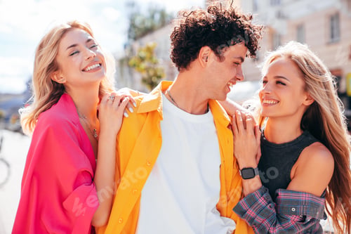 Preview: Man and two women outdoors