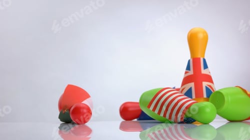 Preview: Fallen bowling pins on white background.