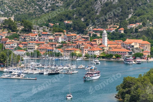 Preview: Tourist ships and sailing boats in marina in old town of Skradin in Croatia