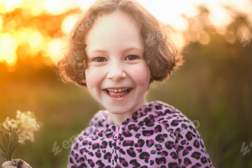 Preview: Portrait of girl wearing animal print hooded top looking at camera smiling