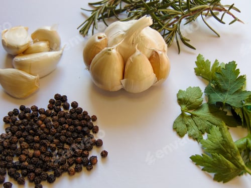 Preview: garlic spices pepper on a white background