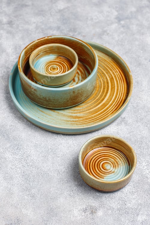 Preview: Different ceramic empty plates and bowls.