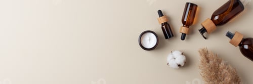 Preview: Cosmetic skin care products with pampas on pastel beige background. Flat lay, copy space