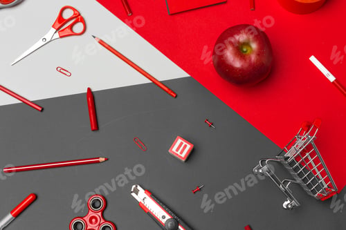 Preview: school supplies at colorful paper background