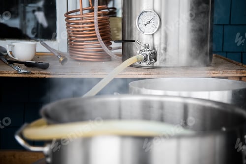 Preview: Home Brewing Kit and Pouring Craft Beer Wort into the Boil Kettl