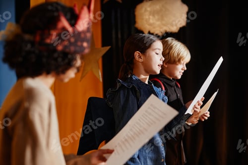 Preview: Children Rehearsing Play With Scripts Objects in Hand