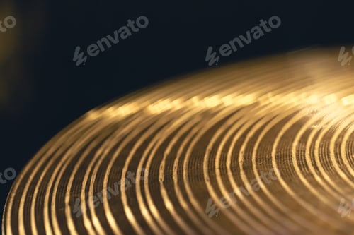 Preview: Drum cymbal close-up on a dark background.