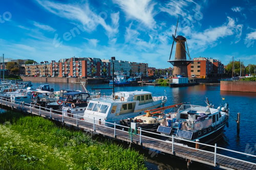 Preview: View of the harbour of Delfshaven and the old grain mill De Destilleerketel. Rotterdam, Netherlands