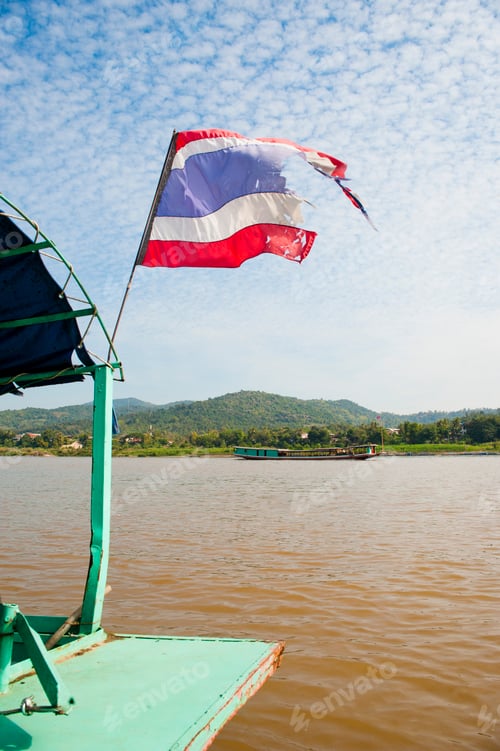 Preview: Ripped Thai Flag on the Slow Boat from Thailand to Laos, Southeast Asia
