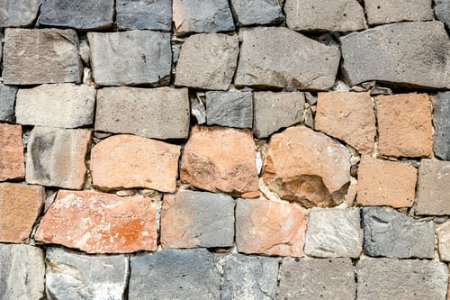 Preview: wall from red and black tuff stones