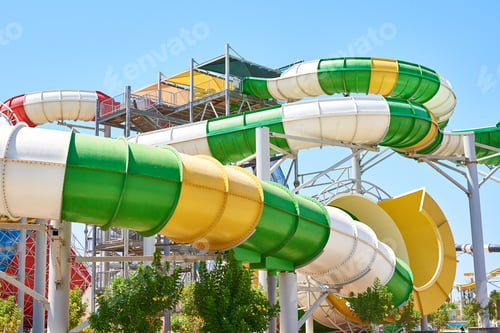 Preview: Close up of a tube water slide in aqua park against blue sky