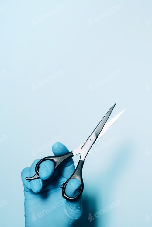 Preview: Hairdresser's hands with scissors. New normal concept. Copy space. Stay safe. Health protection