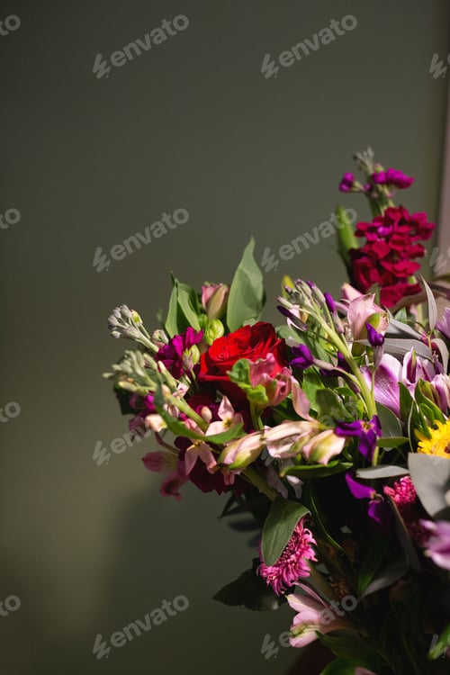 Preview: Still life. luxury spring flowers on a black background. color bloom. Low key photo