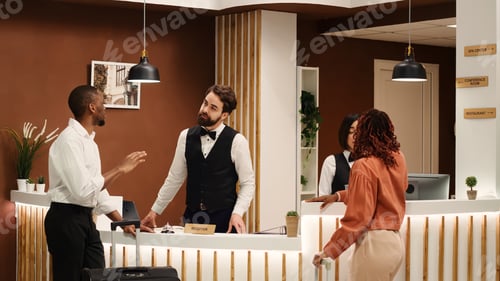 Preview: Receptionists answering guests inquiries