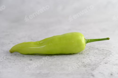 Preview: Green peppers on white background