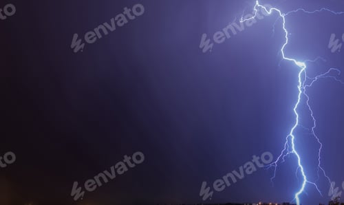 Preview: Mighty lightning strike in the purple shaded sky