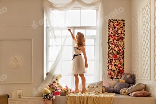 Preview: Woman in Dress Reaching for Curtain near Window