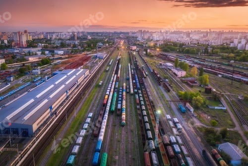 Preview: Aerial view of freight trains at sunset. Top view of railroad