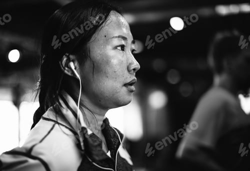 Preview: People exercising at fitness gym