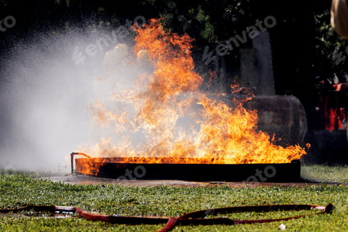 Preview: Fire flame in a firefighting training exercise. Firefighter training Concept.
