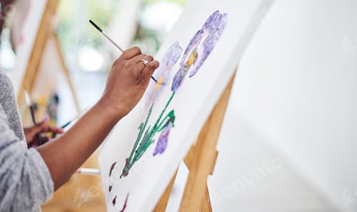 Preview: Cropped shot of an unrecognizable woman working on a painting in a art studio
