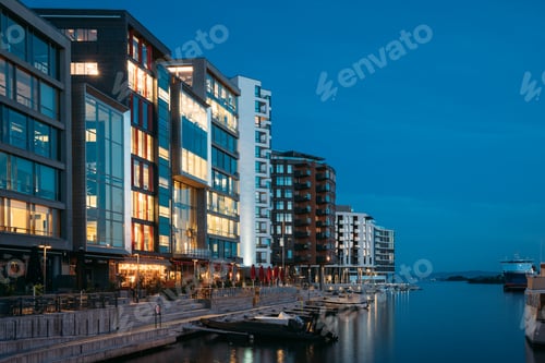 Preview: Oslo, Norway. Night View Embankment And Residential Multi-storey Houses In Aker Brygge District