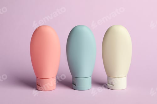 Preview: Cosmetic travel on violet background. Bath accessories