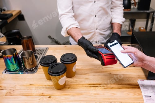 Preview: Customer paying contactless with their smartphone