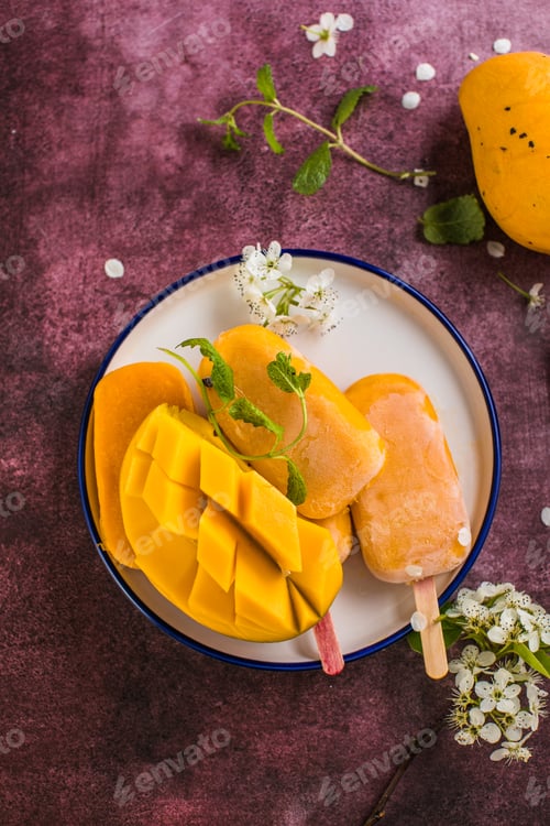 Preview: Mango banana popsicles with fresh fruits, flat lay top view