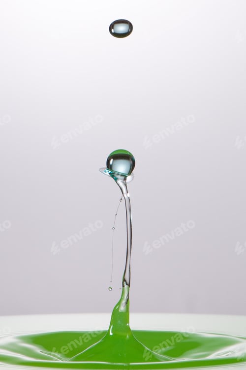 Preview: Splash of colorful liquid with high speed flash
