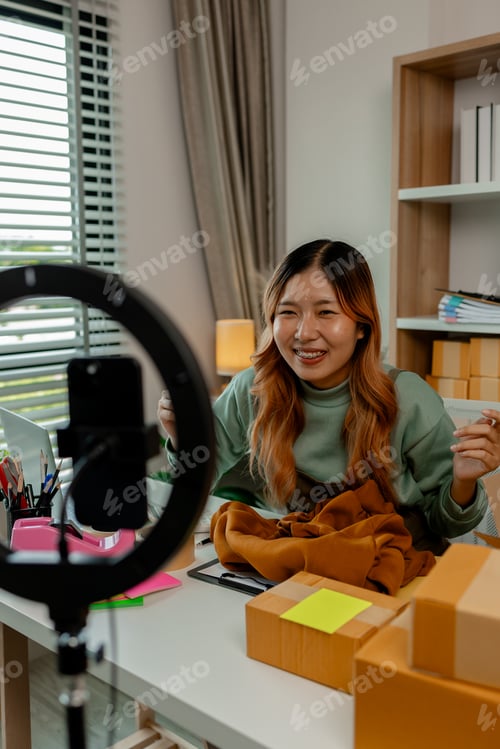 Preview: the business owner or an entrepreneur is doing live marketing to sell her products that is clothing