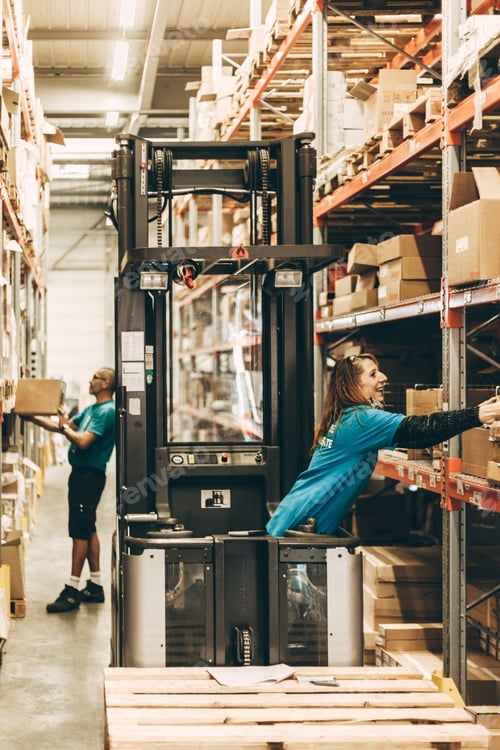 Preview: A woman and a man working on a distribution center warehouse