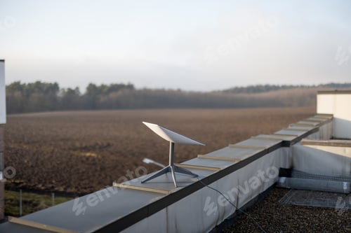 Preview: Starlink satellite dish on roof of residential building