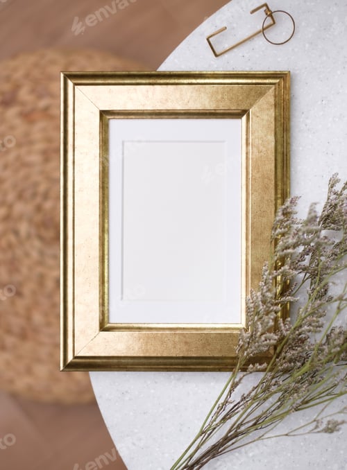 Preview: mockup gold photo frame on white stone round table with sunlight