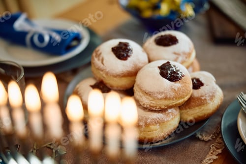 Preview: Jam filled donuts on the table during Hanukkah celebration.