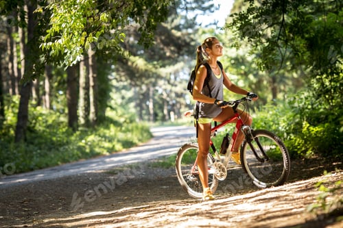 Preview: Riding a bike in the nature.