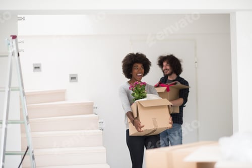 Preview: multiethnic couple moving into a new home