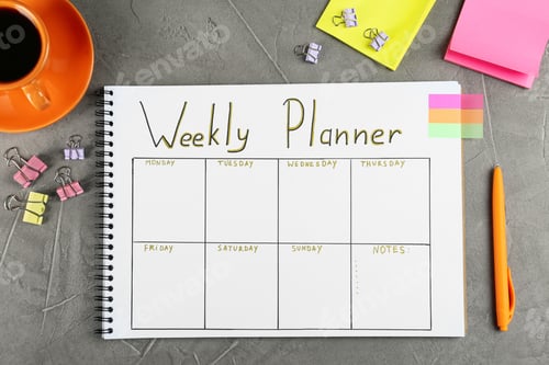 Preview: Flat lay composition of notebook with weekly plan on grey table