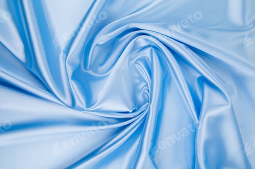 Preview: Soft folds of blue silk cloth texture.