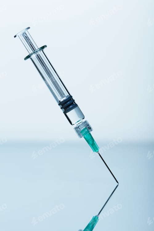Preview: Syringe with needle standing upright