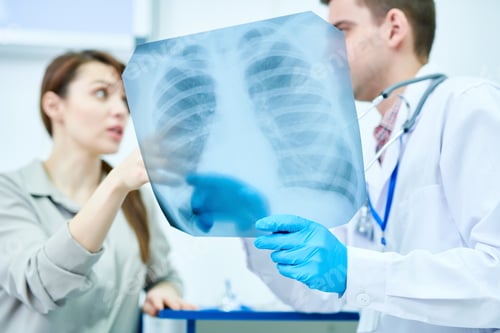 Preview: Doctor Discussing X-Ray Image