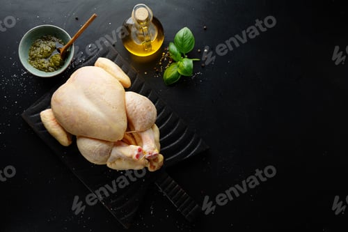 Preview: Raw whole chicken on table